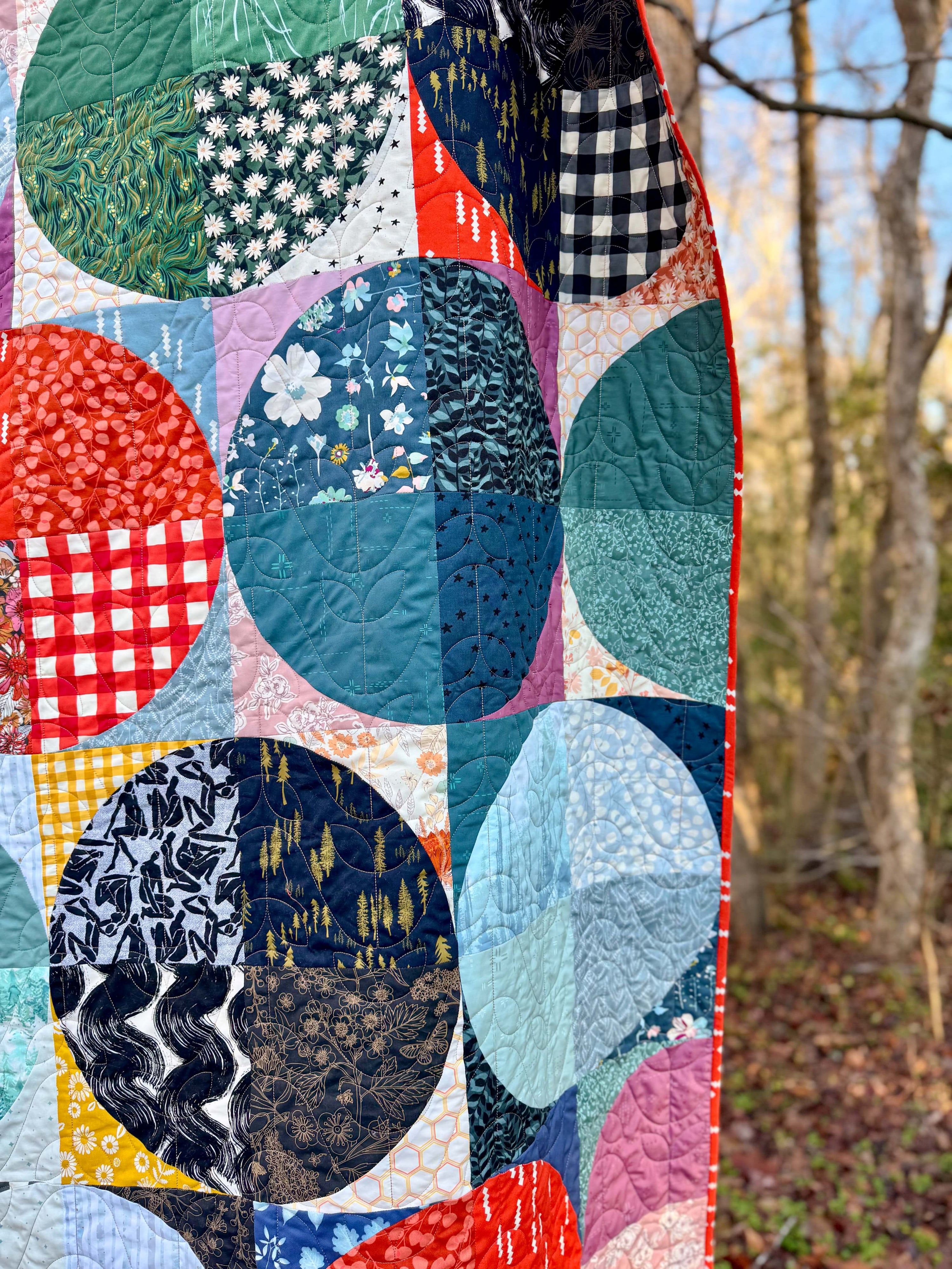 modern circles patchwork quilt in bright nature-inspired colors